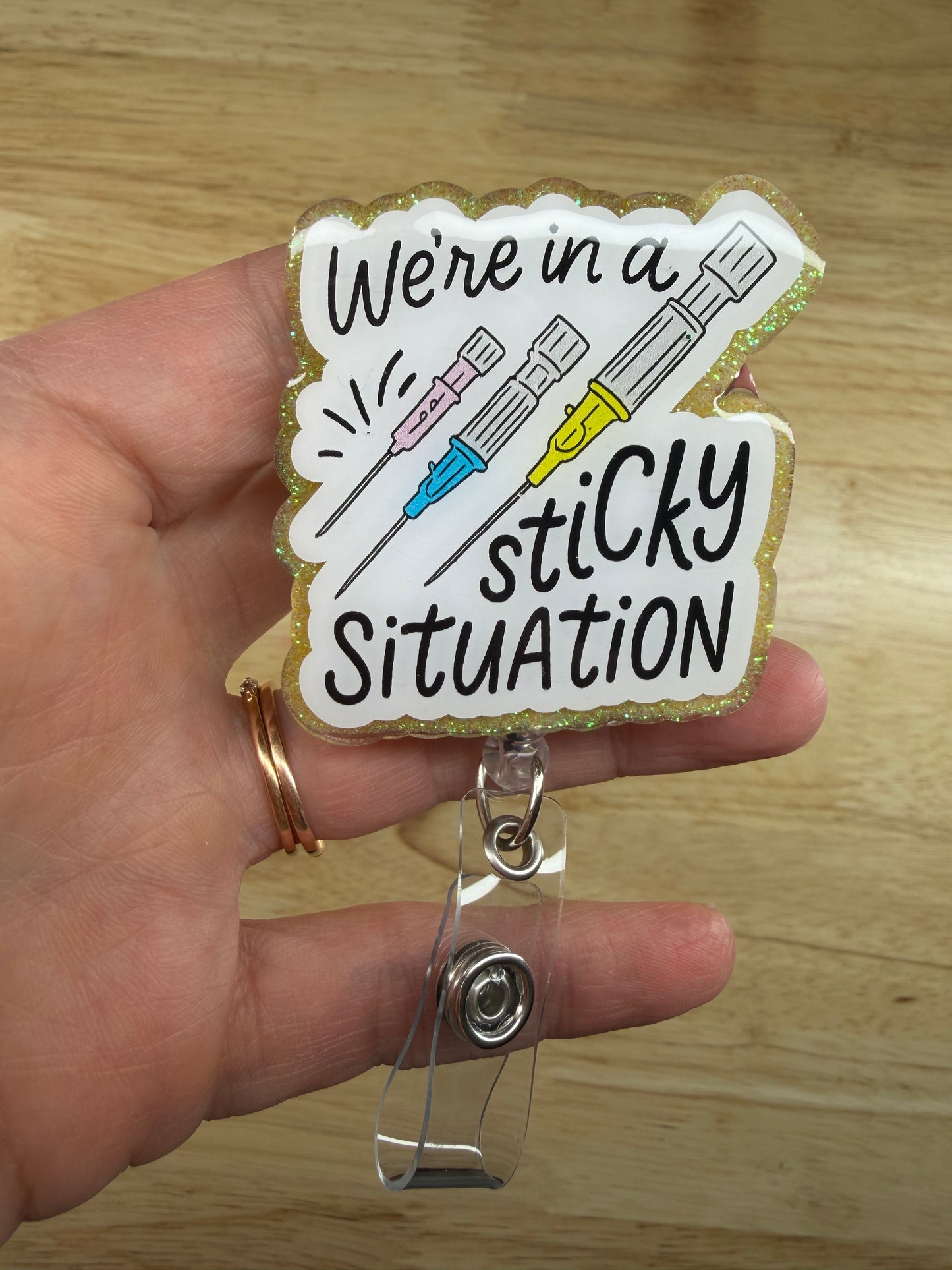 We’re In A Sticky Situation Badge Reel with Alligator Clip
