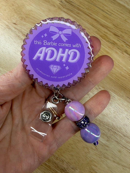 This Barbie Comes With ADHD Badge Reel